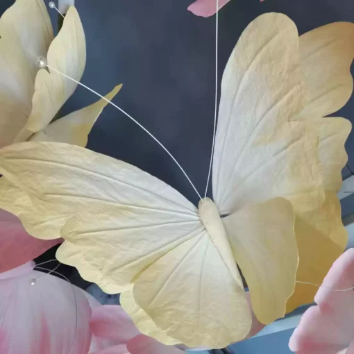 Elegant Pink and Yellow Butterfly Backdrop with Lightweight Sustainable Paper Props