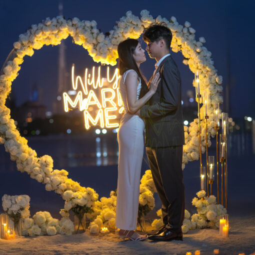 Elegant Proposal Planner in Dubai: Heart-Shaped White Rose Arch for Wedding Bliss