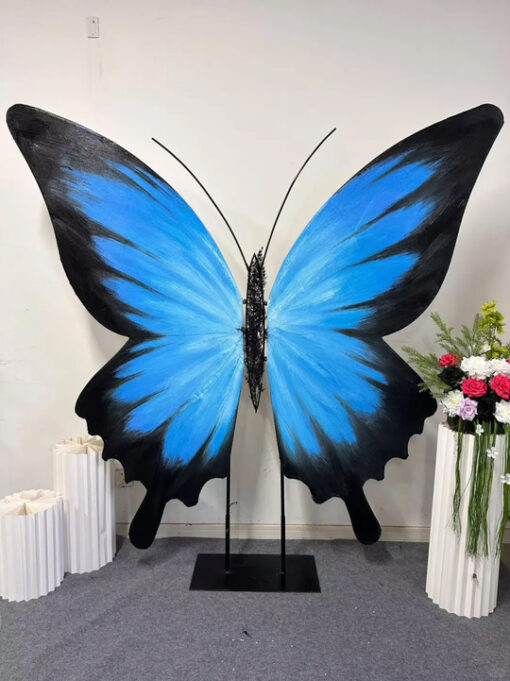 Eye-Catching Blue Gradient Butterfly Wing Backdrop for Weddings and Events