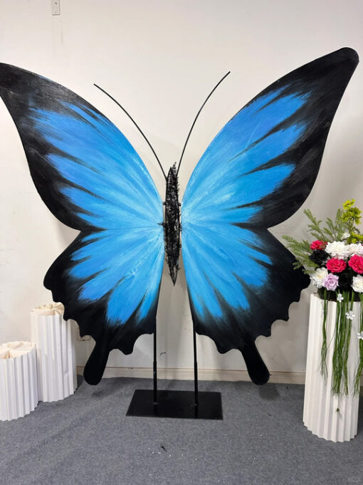 Eye-Catching Blue Gradient Butterfly Wing Backdrop for Weddings and Events
