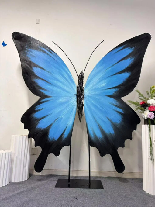 Eye-Catching Blue Gradient Butterfly Wing Backdrop for Weddings and Events