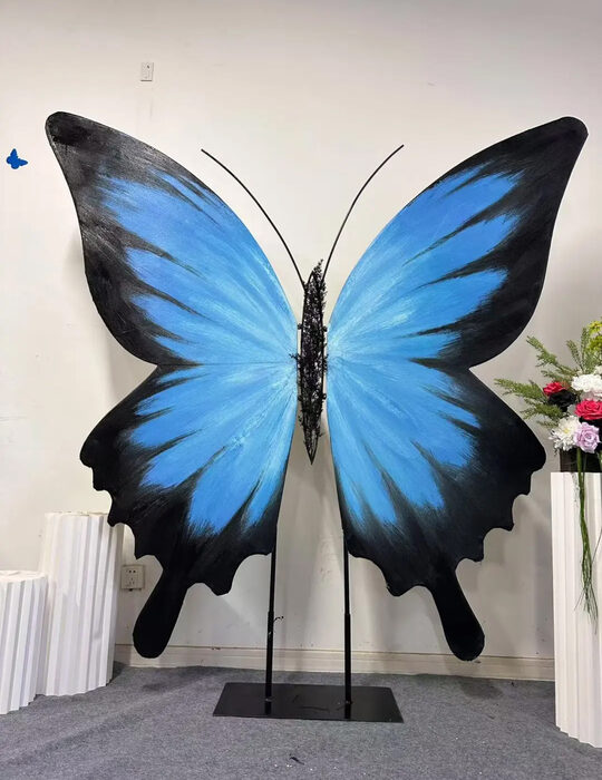 Eye-Catching Blue Gradient Butterfly Wing Backdrop for Weddings and Events