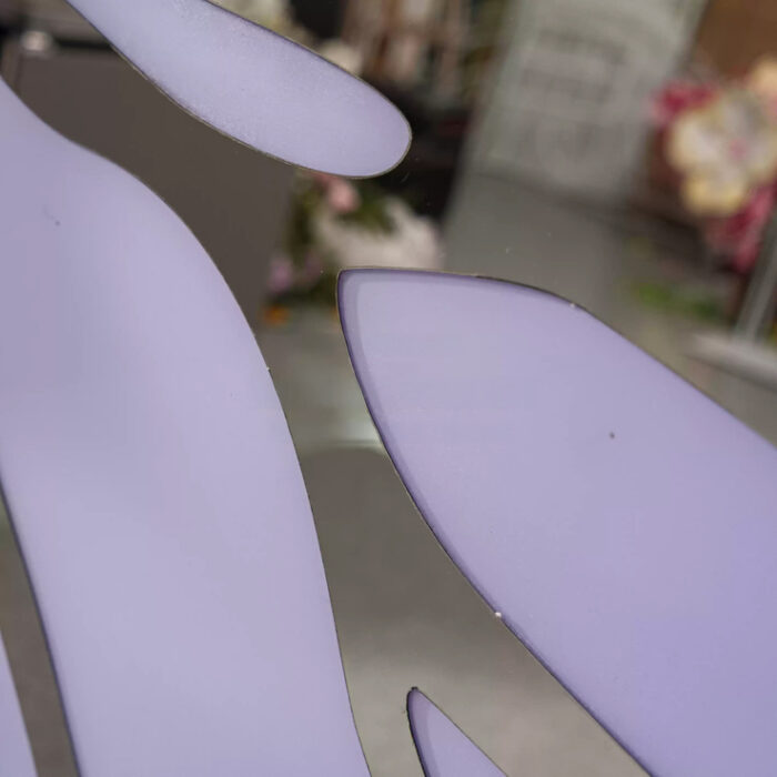 Eye-Catching Butterfly Backdrop with Mirror Details and Artificial Floral Arrangement