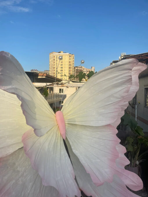 Handcrafted White and Pink Butterfly Backdrop for Elegant Outdoor Weddings
