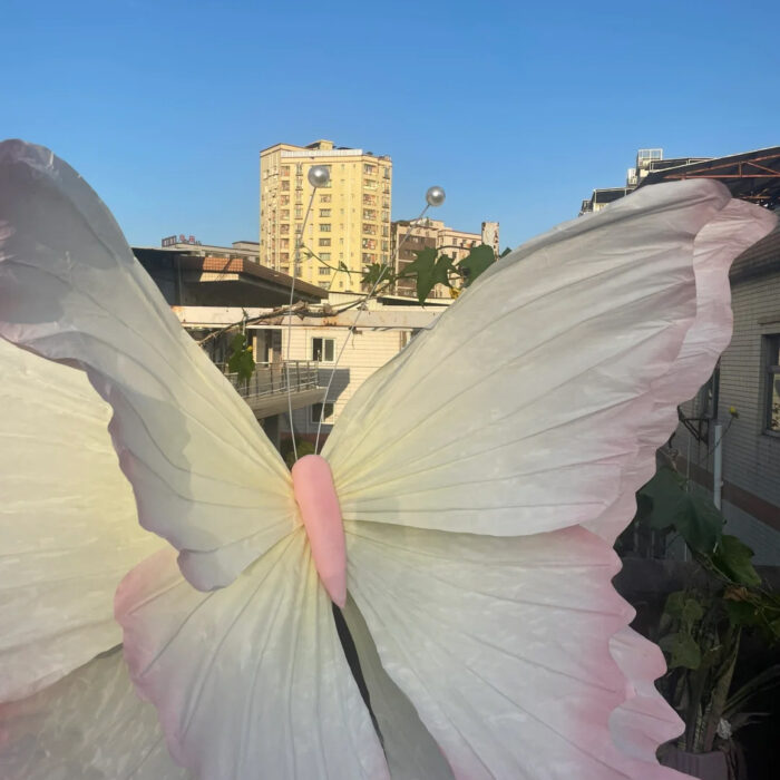 Handcrafted White and Pink Butterfly Backdrop for Elegant Outdoor Weddings