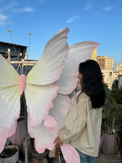 Handcrafted White and Pink Butterfly Backdrop for Elegant Outdoor Weddings
