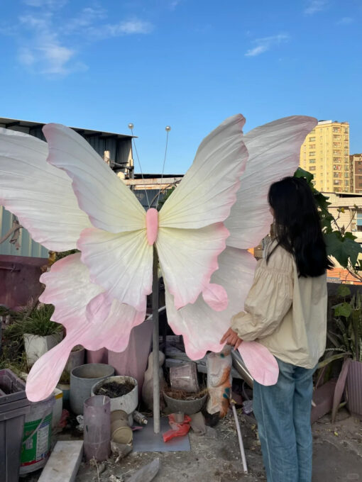Handcrafted White and Pink Butterfly Backdrop for Elegant Outdoor Weddings