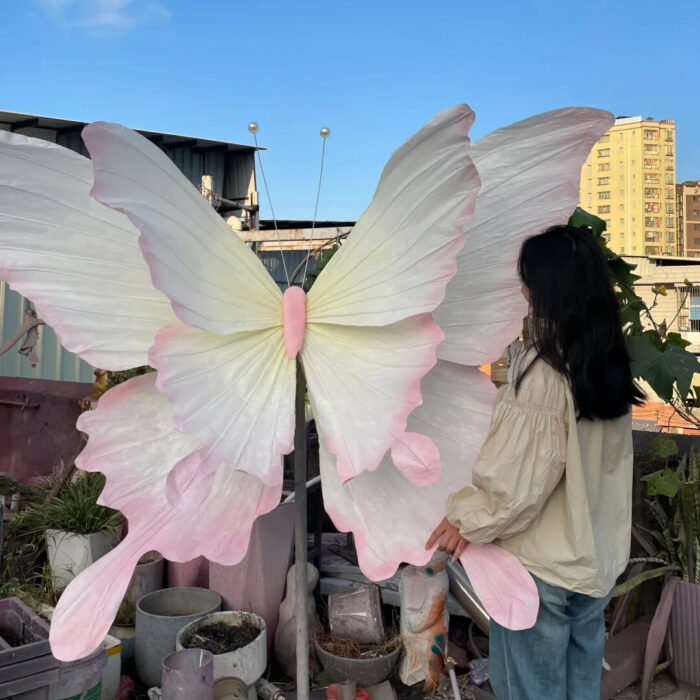 Handcrafted White and Pink Butterfly Backdrop for Elegant Outdoor Weddings