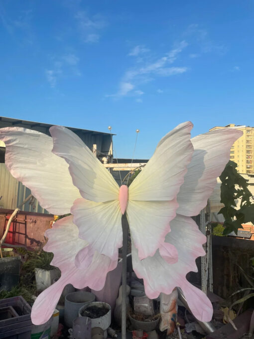 Handcrafted White and Pink Butterfly Backdrop for Elegant Outdoor Weddings