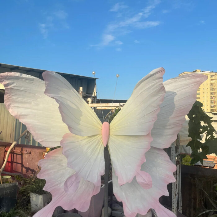 Handcrafted White and Pink Butterfly Backdrop for Elegant Outdoor Weddings