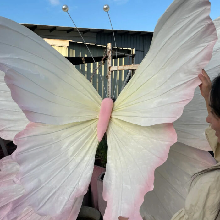 Handcrafted White and Pink Butterfly Backdrop for Elegant Outdoor Weddings