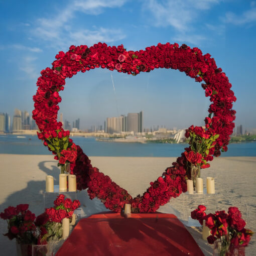 Heart-Shaped Wedding Arch with Red Roses: Perfect Dubai Wedding Backdrop