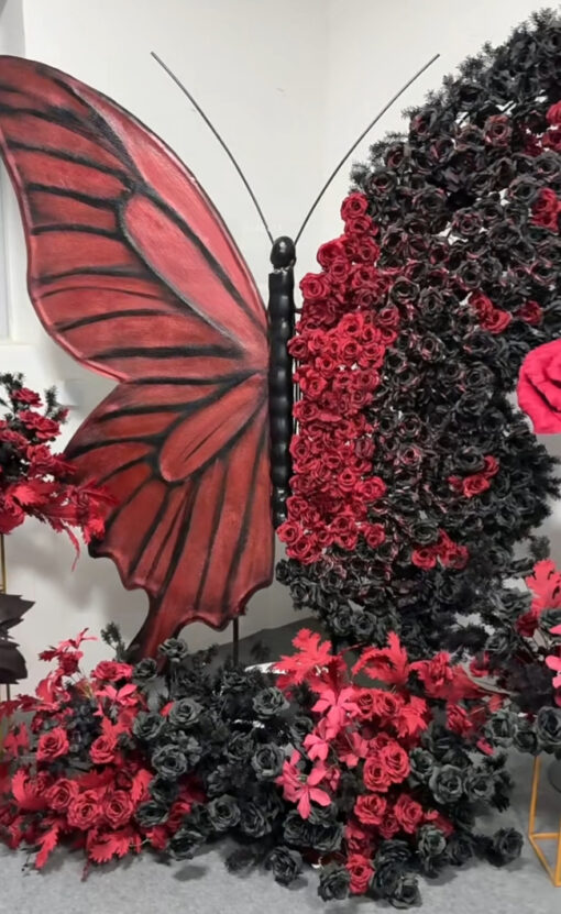 Intricate Gothic Butterfly Backdrop with Red and Black Gradient for Weddings
