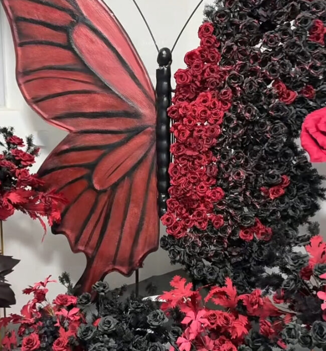 Intricate Gothic Butterfly Backdrop with Red and Black Gradient for Weddings