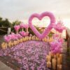 Light Pink Wedding Backdrop with Floral Archway and Roses for a Dreamy Celebration