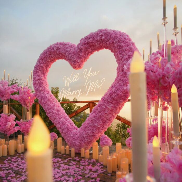Light Pink Wedding Backdrop with Floral Archway and Roses for a Dreamy Celebration
