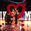 Love-Filled Heart Arch with Red Roses for an Unforgettable Proposal Backdrop