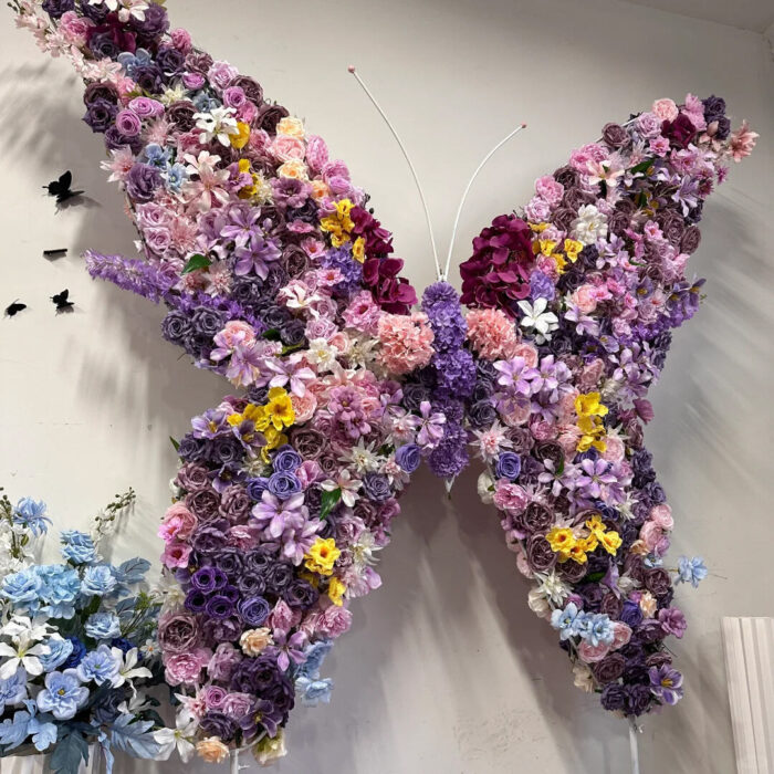 Luxury Butterfly Backdrop Featuring Multicolor Floral Arrangement for Memorable Events