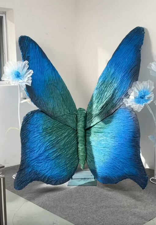 Magical Blue and Green Gradient Butterfly Backdrop for Picture-Perfect Weddings