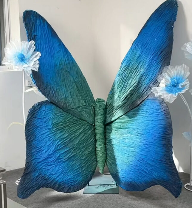 Magical Blue and Green Gradient Butterfly Backdrop for Picture-Perfect Weddings