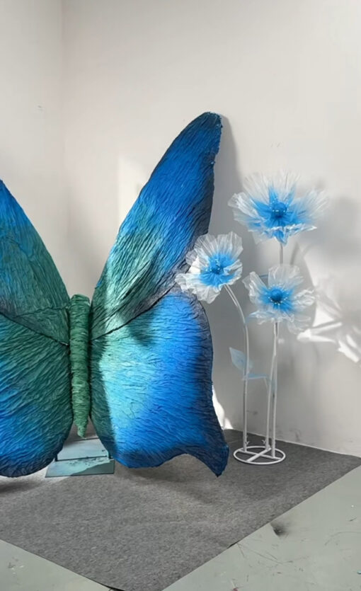 Magical Blue and Green Gradient Butterfly Backdrop for Picture-Perfect Weddings