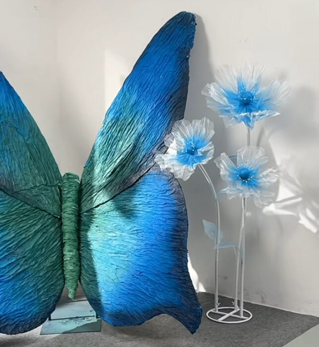 Magical Blue and Green Gradient Butterfly Backdrop for Picture-Perfect Weddings