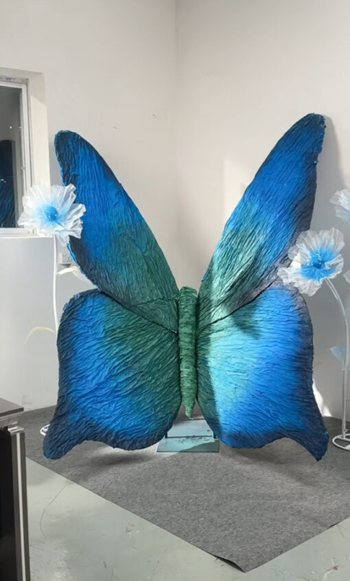Magical Blue and Green Gradient Butterfly Backdrop for Picture-Perfect Weddings