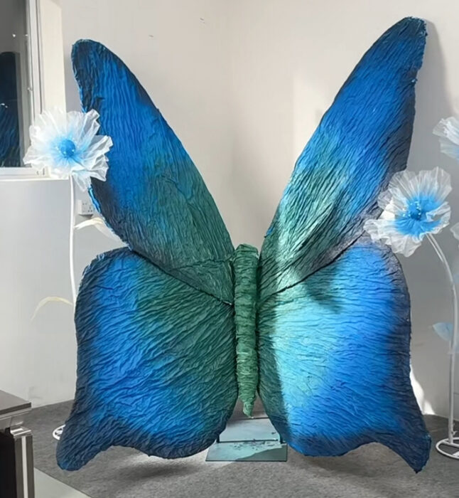 Magical Blue and Green Gradient Butterfly Backdrop for Picture-Perfect Weddings