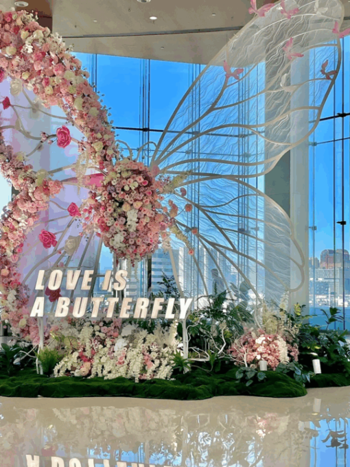 Magical Wedding Butterfly Backdrop with Soft Pink Roses and Elegant Details