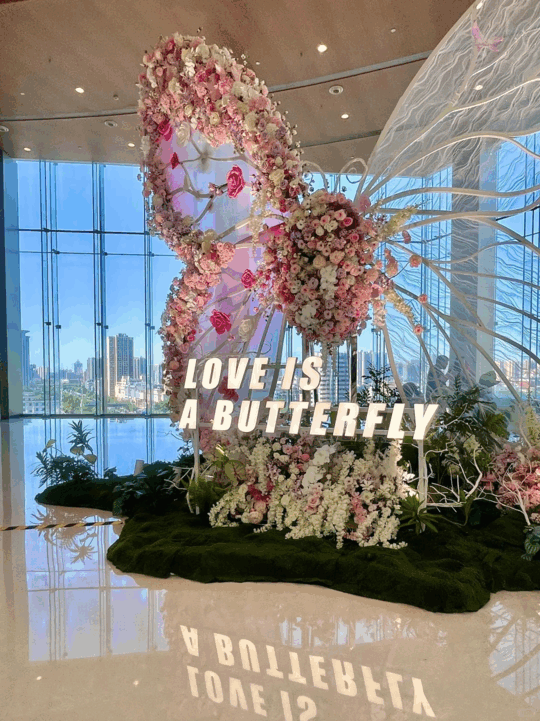 Magical Wedding Butterfly Backdrop with Soft Pink Roses and Elegant Details