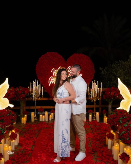 Opulent Red Rose Heart-Shaped Floral Wall for a Dreamlike Proposal