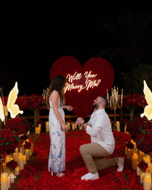 Opulent Red Rose Heart-Shaped Floral Wall for a Dreamlike Proposal