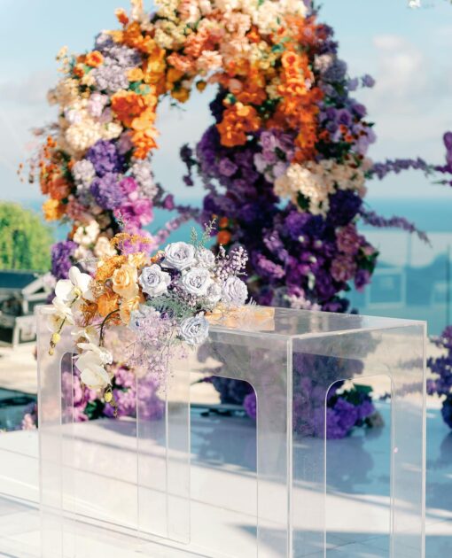 Outdoor Bohemian Wedding in Bali: Colorful Orange and Purple Arches with Floral Touch
