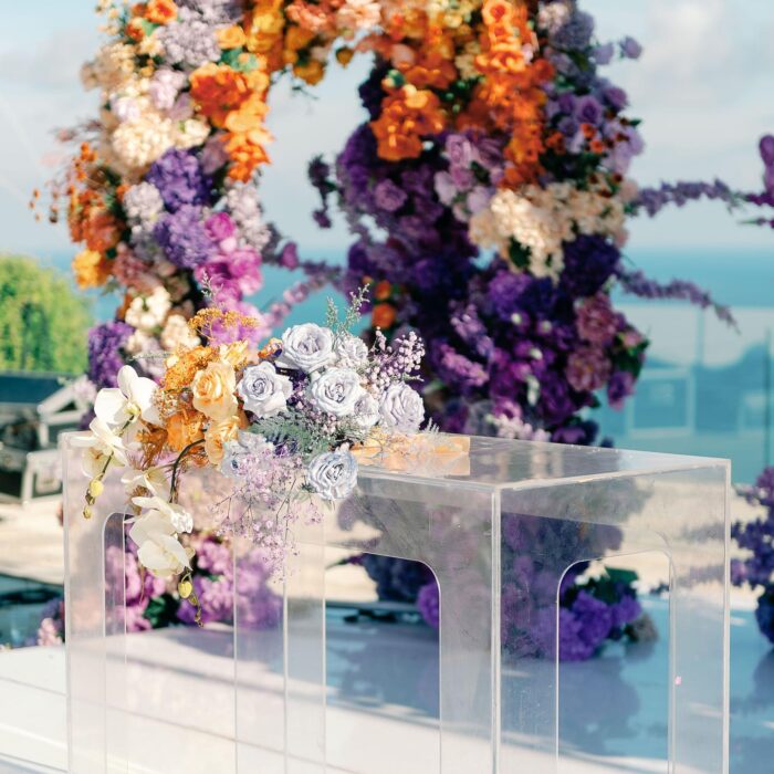 Outdoor Bohemian Wedding in Bali: Colorful Orange and Purple Arches with Floral Touch