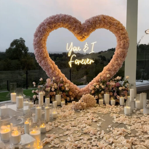 Pink Rose Heart Arch with Floral Backdrop for a Dreamy Anniversary Moment