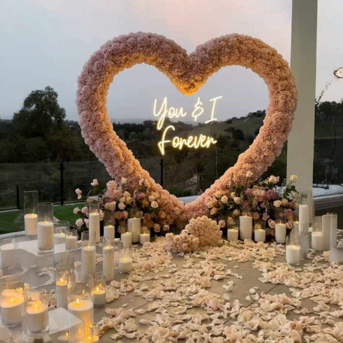 Pink Rose Heart Arch with Floral Backdrop for a Dreamy Anniversary Moment
