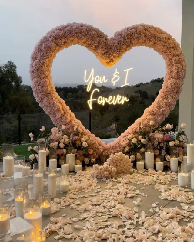 Pink Rose Heart Arch with Floral Backdrop for a Dreamy Anniversary Moment