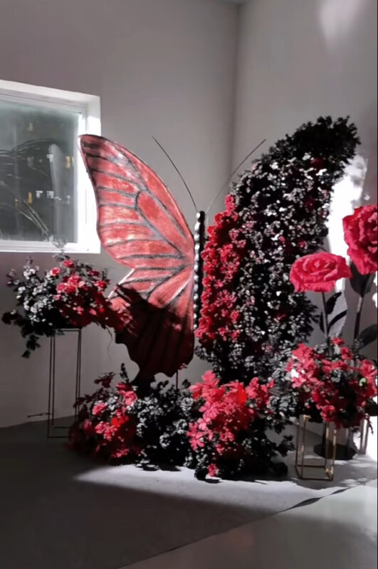 Red and Black Butterfly Backdrop Perfect for Gothic-Inspired Evening Galas