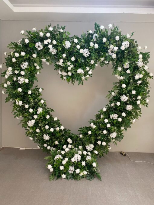 Romantic Heart-Shaped Arch with White Star Roses and Lush Greenery for a Dreamy Wedding Backdrop