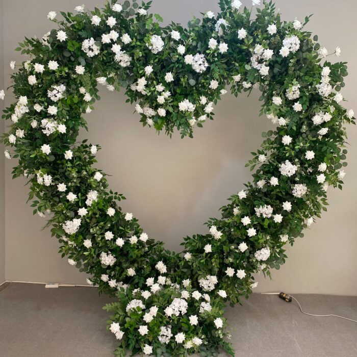 Romantic Heart-Shaped Arch with White Star Roses and Lush Greenery for a Dreamy Wedding Backdrop