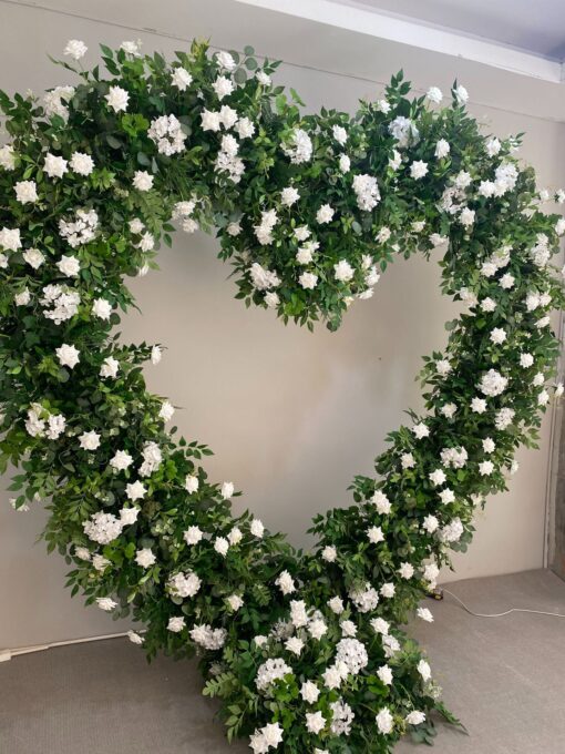 Romantic Heart-Shaped Arch with White Star Roses and Lush Greenery for a Dreamy Wedding Backdrop