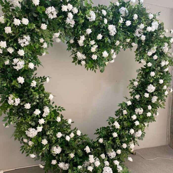 Romantic Heart-Shaped Arch with White Star Roses and Lush Greenery for a Dreamy Wedding Backdrop