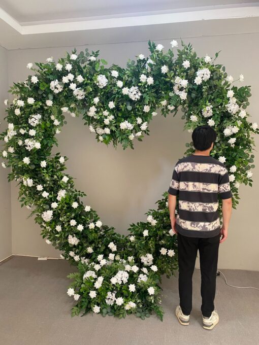 Romantic Heart-Shaped Arch with White Star Roses and Lush Greenery for a Dreamy Wedding Backdrop