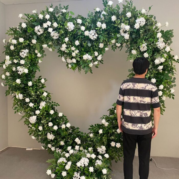 Romantic Heart-Shaped Arch with White Star Roses and Lush Greenery for a Dreamy Wedding Backdrop