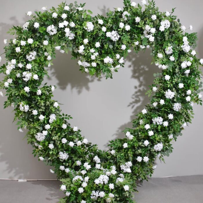 Romantic Heart-Shaped Arch with White Star Roses and Lush Greenery for a Dreamy Wedding Backdrop