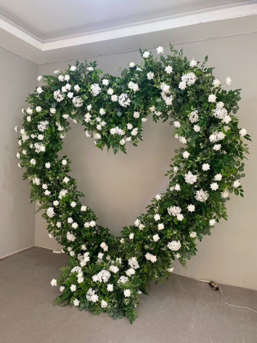 Romantic Heart-Shaped Arch with White Star Roses and Lush Greenery for a Dreamy Wedding Backdrop
