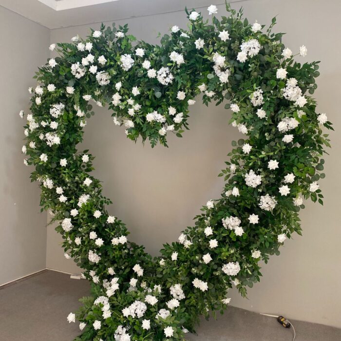 Romantic Heart-Shaped Arch with White Star Roses and Lush Greenery for a Dreamy Wedding Backdrop