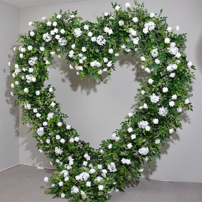 Romantic Heart-Shaped Arch with White Star Roses and Lush Greenery for a Dreamy Wedding Backdrop