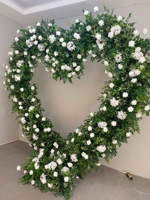 Romantic Heart-Shaped Arch with White Star Roses and Lush Greenery for a Dreamy Wedding Backdrop