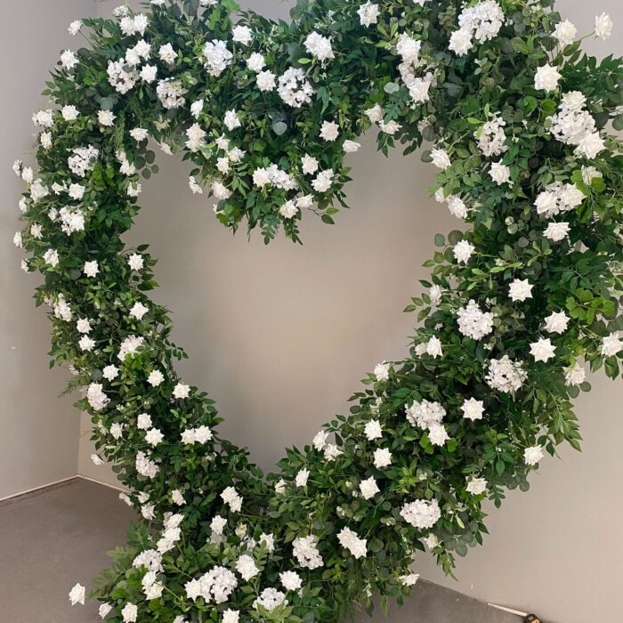 Romantic Heart-Shaped Arch with White Star Roses and Lush Greenery for a Dreamy Wedding Backdrop